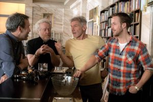 (From left to right) Director Denis Villeneuve, Producer Ridley Scott, Harrison Ford, Ryan Gosling on the set of 'Blade Runner 2049' (Photo by Steven Vaughan, courtesy of Warner Bros.)