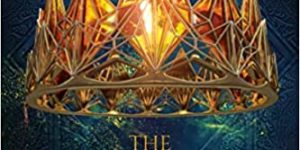 The Amber Crown book cover. Teal green cover with a crown in the centre. The crown is set with pieces of amber. The font is in a matching golden amber.